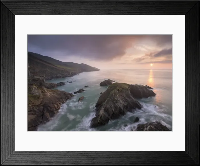 Framed Print : Sun setting over the North Devon coast, England. Spring (April)