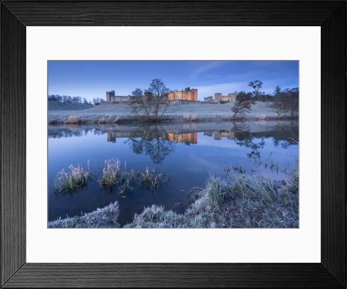 Framed Print : Alnwick Castle reflected in the River Aln on a frosty winter morning, Northumberland, England