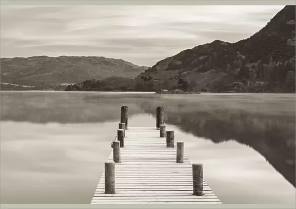 Frosty jetty on Ullswater at dawn, Lake District, Cumbria, England. Winter (November)