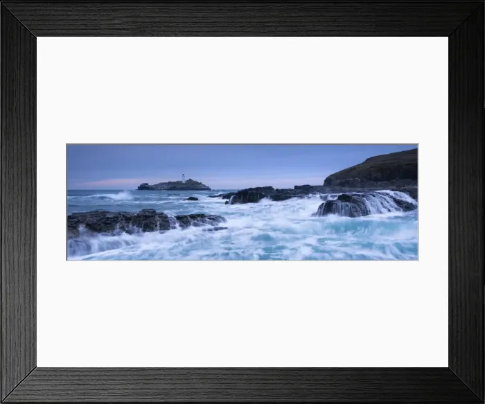 Framed Print : Waves crash around the rocks near Godrevy Lighthouse, Cornwall, England. Winter Framed Print : Waves crash around the rocks near Godrevy Lighthouse, Cornwall, England. Winter
