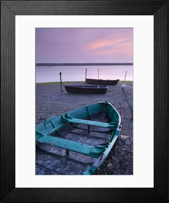 Framed Print : Boats at low tide on the shore of The Fleet lagoon, Chesil Beach, Dorset, England. Spring Framed Print : Boats at low tide on the shore of The Fleet lagoon, Chesil Beach, Dorset, England. Spring