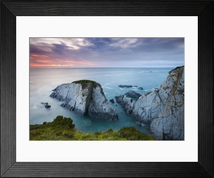 Framed Print : Slate cliffs near Morte Point at sunset, Mortehoe, North Devon, England. Summer Framed Print : Slate cliffs near Morte Point at sunset, Mortehoe, North Devon, England. Summer