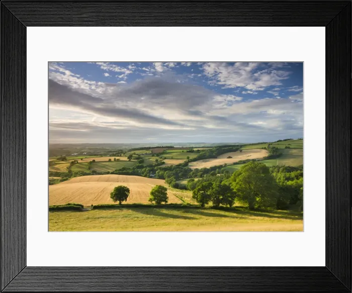Framed Print : Beautiful sky above summer countryside, Raddon Hill, Crediton, Devon, England. Summer Framed Print : Beautiful sky above summer countryside, Raddon Hill, Crediton, Devon, England. Summer