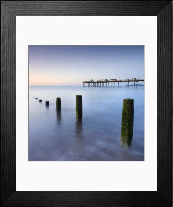 Framed Print : Teignmouth Pier and coastal defences at Teignmouth, South Devon, England. Summer Framed Print : Teignmouth Pier and coastal defences at Teignmouth, South Devon, England. Summer
