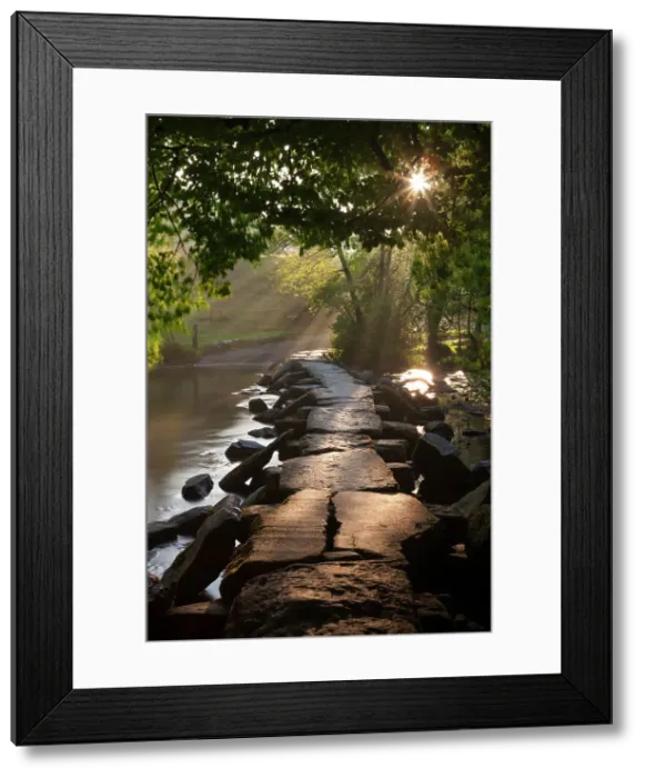 Framed Print : Ancient clapper bridge Tarr Steps spanning the River Barle in Exmoor, Somerset, England Framed Print : Ancient clapper bridge Tarr Steps spanning the River Barle in Exmoor, Somerset, England