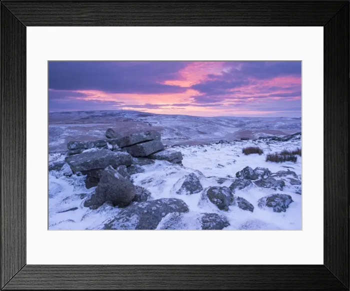 Framed Print : Beautiful sunrise over a frozen and snow covered Belstone Tor, Dartmoor National Park Framed Print : Beautiful sunrise over a frozen and snow covered Belstone Tor, Dartmoor National Park