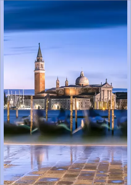 Italy, Veneto, Venice. High tide coming to Riva degli Schiavoni at dawn