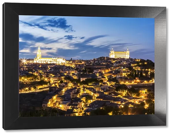 Spain, Castilea'La Mancha, Toledo. City with the Cathedral and the Alcazar at dusk