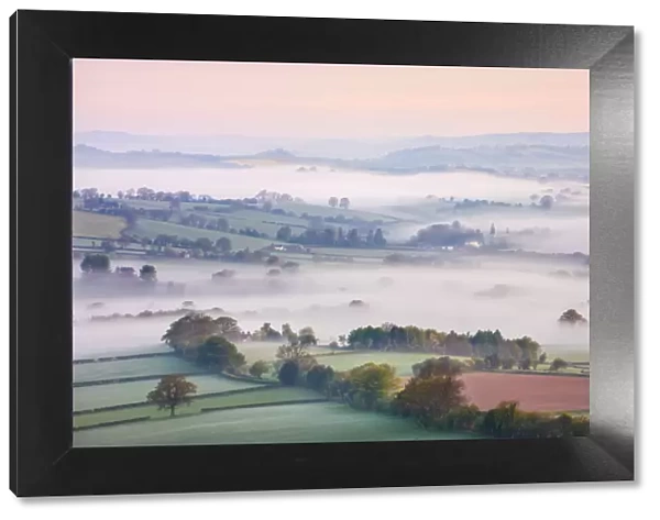 Mist covered countryside at dawn near Pennorth, Brecon Beacons National Park, Powys, Wales