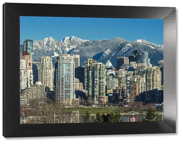 Downtown skyline with snowy mountains behind, Vancouver, British Columbia, Canada