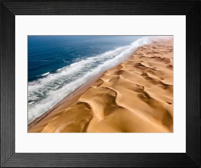 Framed Print : Langewand, Aerial view of where the Atlantic Ocean meets the sea of dunes in Western