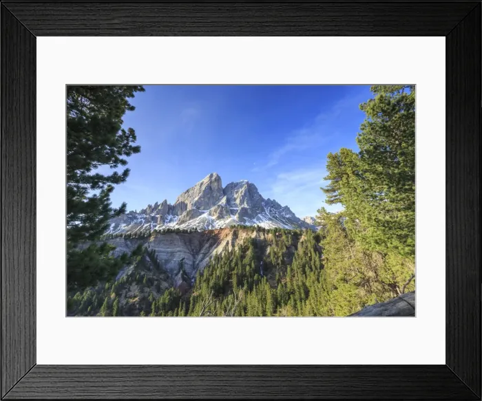 Framed Print : Sass de Putia in background enriched by green woods