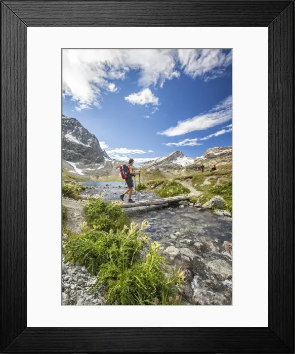 Framed Print : Hiker crossing a stream Engadine Canton of Grisons Switzerland Europe Framed Print : Hiker crossing a stream Engadine Canton of Grisons Switzerland Europe