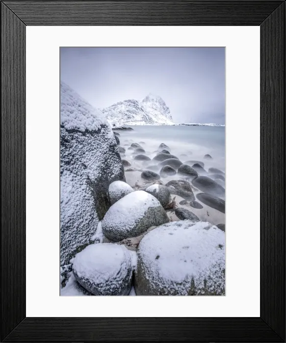 Framed Print : Snow covered rocks on the beach modeled by the wind surround the icy sea Pollen Vareid Framed Print : Snow covered rocks on the beach modeled by the wind surround the icy sea Pollen Vareid