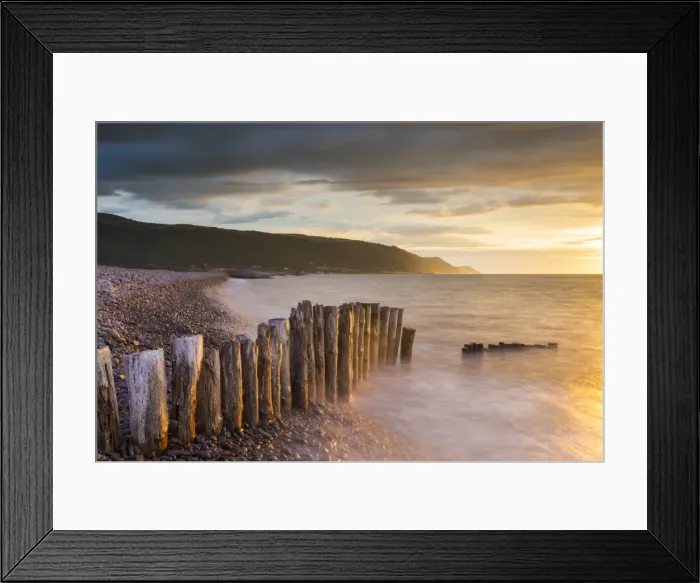 Framed Print : Weathered wooden posts on Bossington Beach, Exmoor National Park, Somerset, England Framed Print : Weathered wooden posts on Bossington Beach, Exmoor National Park, Somerset, England