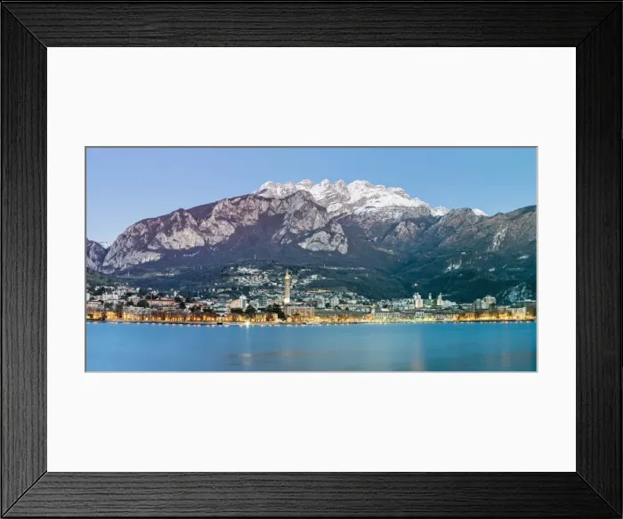 Framed Print : Lake Como, Lombardy, Italy. Panoramic view of Lecco city at dusk with the Resegone Framed Print : Lake Como, Lombardy, Italy. Panoramic view of Lecco city at dusk with the Resegone