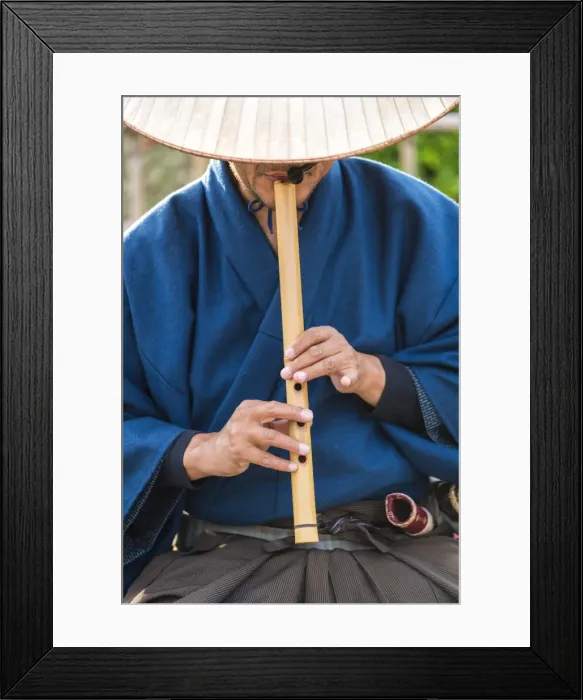 Framed Print : Japanese man playing traditional wooden flute, Kyoto, Japan Framed Print : Japanese man playing traditional wooden flute, Kyoto, Japan