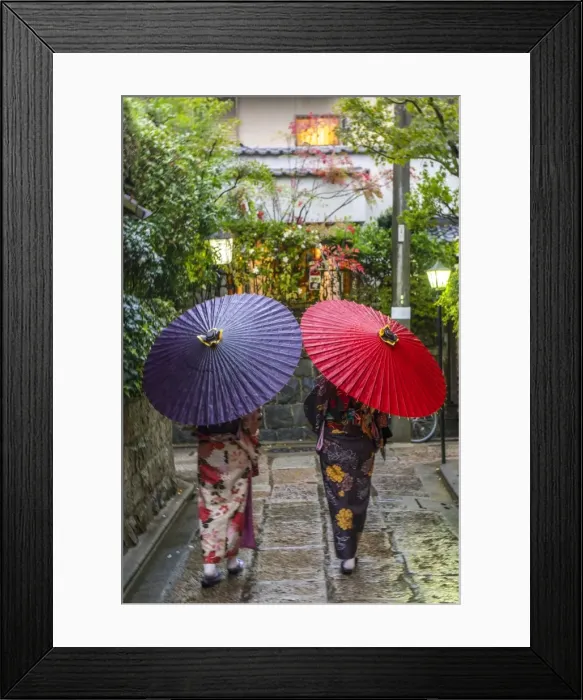 Framed Print : Women in traditional dress with umbrellas walking through Kyoto, Japan Framed Print : Women in traditional dress with umbrellas walking through Kyoto, Japan