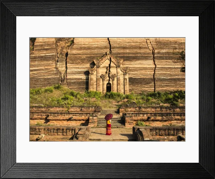 Framed Print : Mingun, Sagaing region, Myanmar (Burma). Woman with red umbrella looks at the Pahtodawgyi
