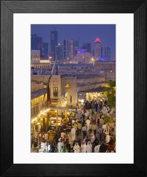 Framed Print : Qatar, Doha, Souq Waqif, redeveloped bazaar area, elevated view with West Bay skyscrapers Framed Print : Qatar, Doha, Souq Waqif, redeveloped bazaar area, elevated view with West Bay skyscrapers