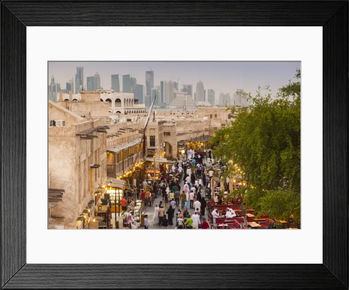 Framed Print : Qatar, Doha, Souq Waqif, redeveloped bazaar area, elevated view with West Bay skyscrapers Framed Print : Qatar, Doha, Souq Waqif, redeveloped bazaar area, elevated view with West Bay skyscrapers