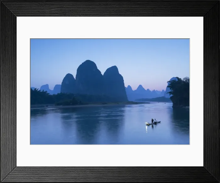 Framed Print : Cormorant fisherman on Li River at dusk, Xingping, Yangshuo, Guangxi, China Framed Print : Cormorant fisherman on Li River at dusk, Xingping, Yangshuo, Guangxi, China