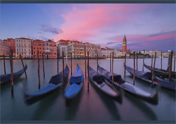 Gondolas at Dorsoduro, Venice, Veneto, Italy. In the background the St. Marks bell tower