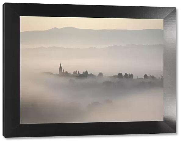 Montefalco in the mist, Umbria, Italy