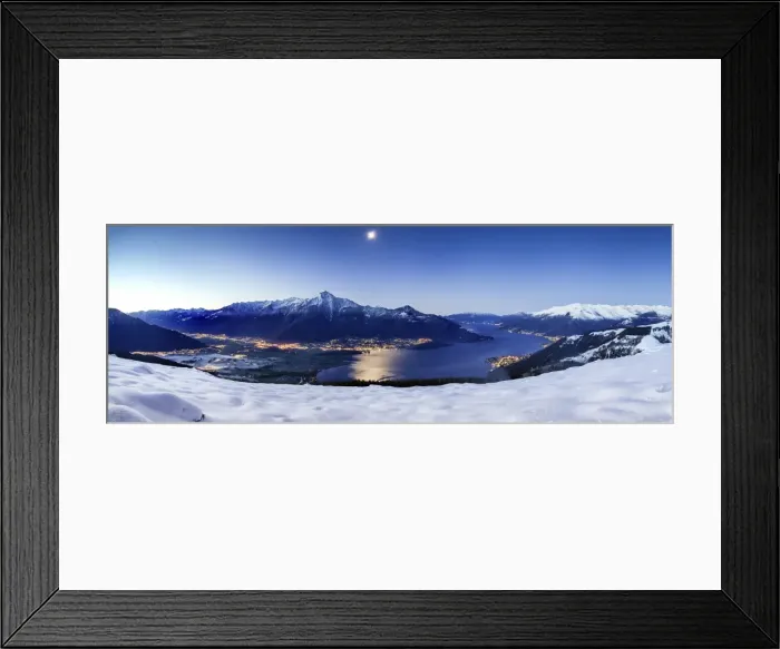Framed Print : Wide angle shot of Alto Lario with Como lake and mount Legnone lighted by the moon in winter