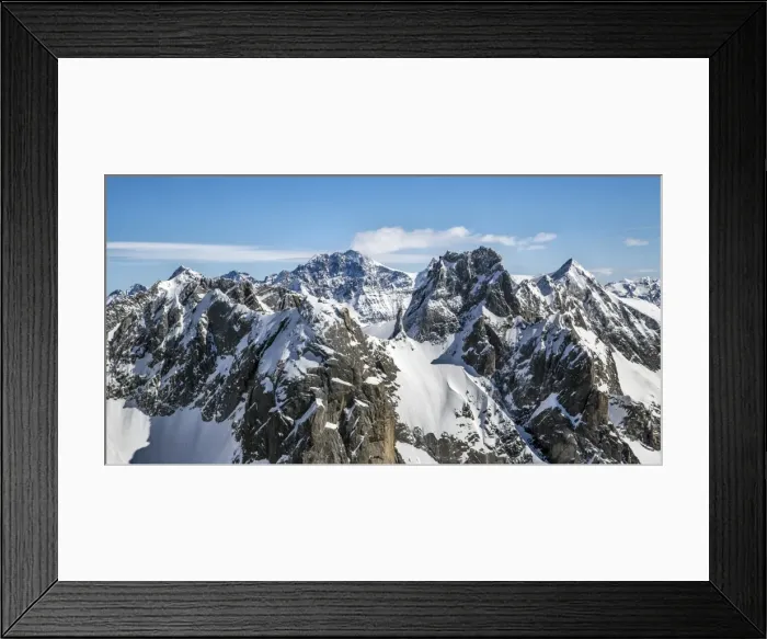 Framed Print : Aerial view of Torrone Peak in winter with Bernina Peak in the background. Valmasino Framed Print : Aerial view of Torrone Peak in winter with Bernina Peak in the background. Valmasino