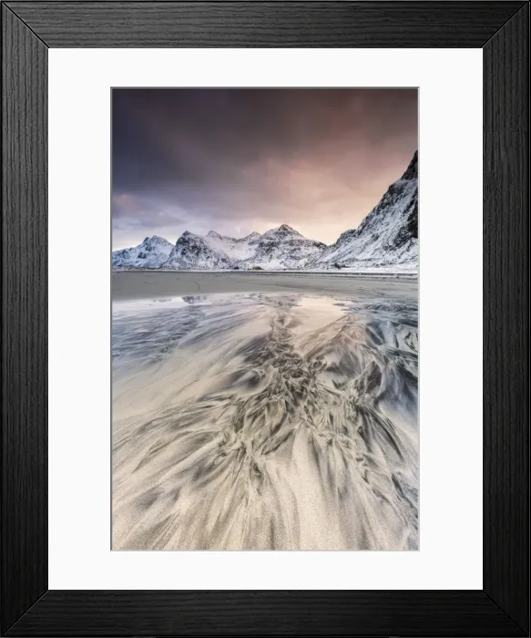 Framed Print : Pink sky on the surreal Skagsanden beach surrounded by snow covered mountains Framed Print : Pink sky on the surreal Skagsanden beach surrounded by snow covered mountains