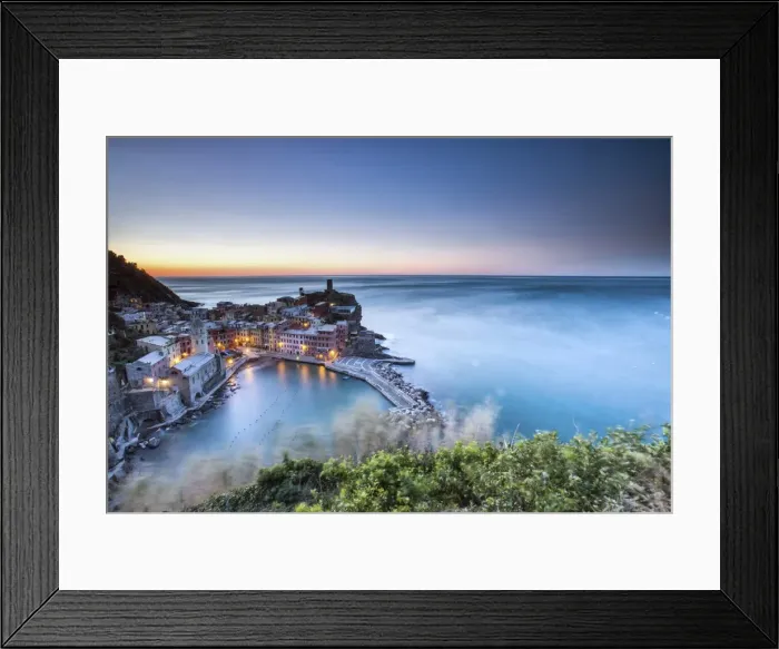 Framed Print : Vernazza and its harbor in a winter night from a lookout along a path in the Cinque Framed Print : Vernazza and its harbor in a winter night from a lookout along a path in the Cinque