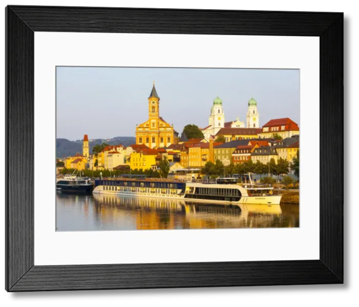 Framed Print : St. Pauls church & St. Stephans Cathedral illuminated at sunset, Passau, Lower Bavaria Framed Print : St. Pauls church & St. Stephans Cathedral illuminated at sunset, Passau, Lower Bavaria