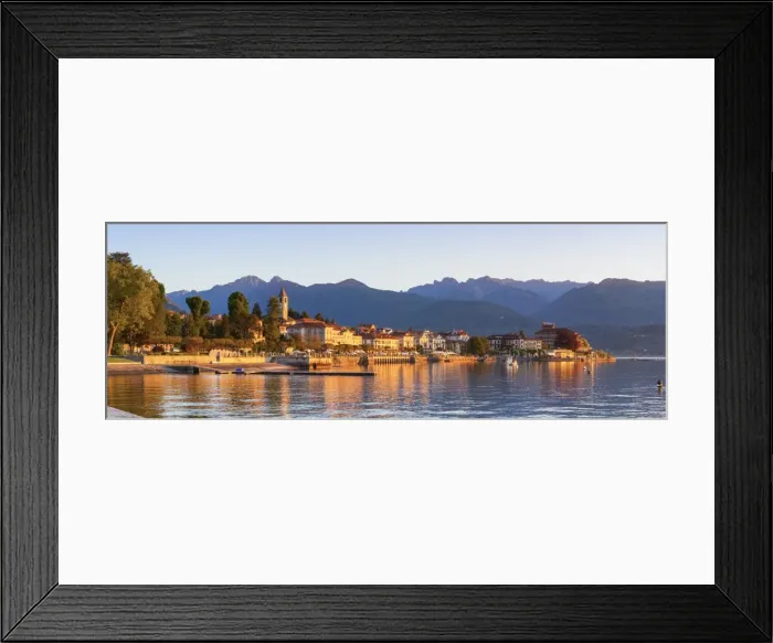 Framed Print : The idyllic lakeside village of Baveno illuminated at sunrise, Lake Maggiore, Piedmont Framed Print : The idyllic lakeside village of Baveno illuminated at sunrise, Lake Maggiore, Piedmont