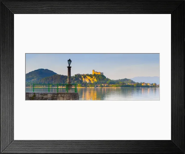 Framed Print : The imposing La Rocca fortress viewd from Arona at sunset, Lake Maggiore, Piedmont, Italy