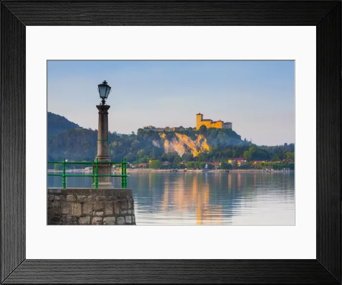 Framed Print : The imposing La Rocca fortress viewd from Arona at sunset, Lake Maggiore, Piedmont, Italy Framed Print : The imposing La Rocca fortress viewd from Arona at sunset, Lake Maggiore, Piedmont, Italy