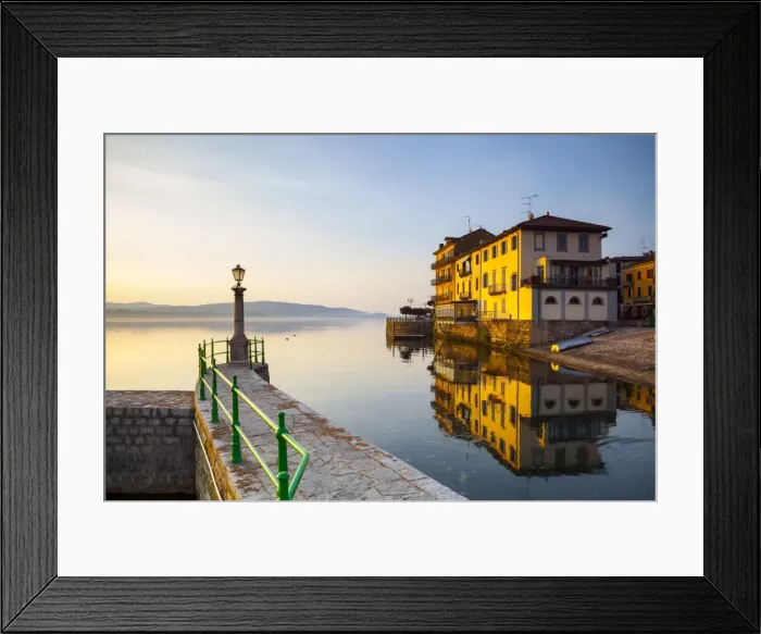 Framed Print : Aronas Picturesque lake-front illuminated at sunrise, Arona, Lake Maggiore, Piedmont Framed Print : Aronas Picturesque lake-front illuminated at sunrise, Arona, Lake Maggiore, Piedmont