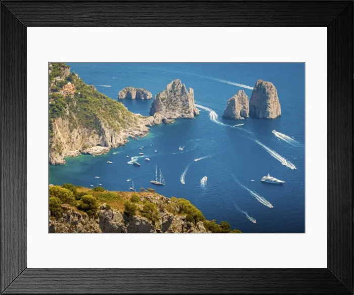 Framed Print : Capri island, Naples, Italy. Aerial view of Faragliioni and coastline from Anacapri Framed Print : Capri island, Naples, Italy. Aerial view of Faragliioni and coastline from Anacapri