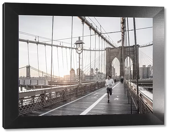 USA, New York, Manhattan, Brooklyn Bridge at Sunrise