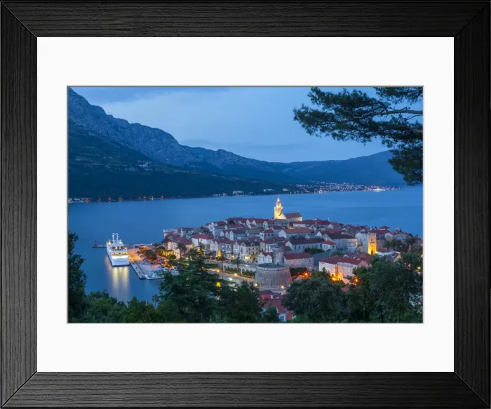 Framed Print : Elevated view over Korculas picturesque Stari Grad illuminated at dusk, Korcula Framed Print : Elevated view over Korculas picturesque Stari Grad illuminated at dusk, Korcula