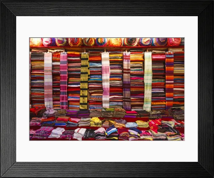 Framed Print : Morocco, Marrakech, Textiles and fabrics in a souk Framed Print : Morocco, Marrakech, Textiles and fabrics in a souk