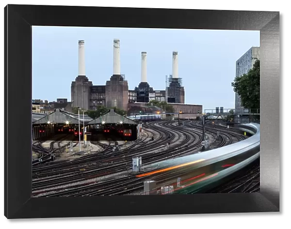 United Kingdom, UK, London, A view of Battersea power station by the railroad tracks