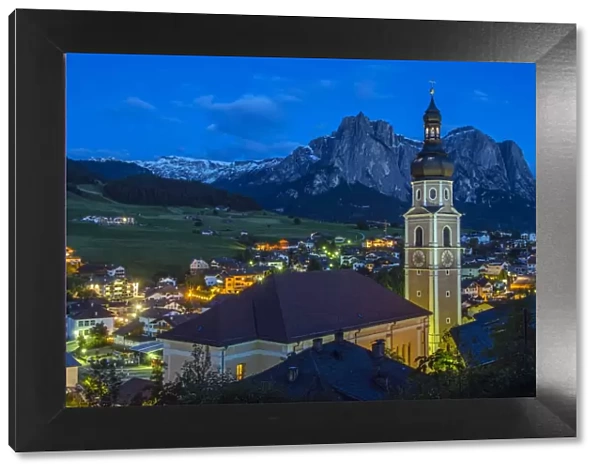 Night view over the mountain village of Castelrotto Kastelruth, Alto Adige or South Tyrol