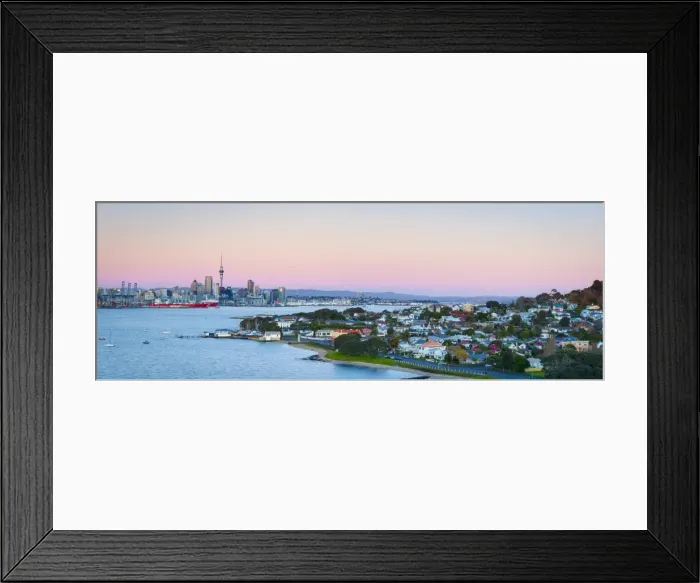 Framed Print : Elevated View Over Devenport towards Central Business District illuminated at dawn, Auckland, New Zealand Framed Print : Elevated View Over Devenport towards Central Business District illuminated at dawn, Auckland, New Zealand