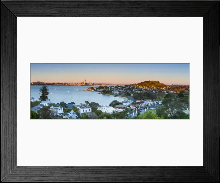 Framed Print : Elevated View Over Devenport towards Central Business District illuminated at sunrise, Auckland, New Zealand Framed Print : Elevated View Over Devenport towards Central Business District illuminated at sunrise, Auckland, New Zealand