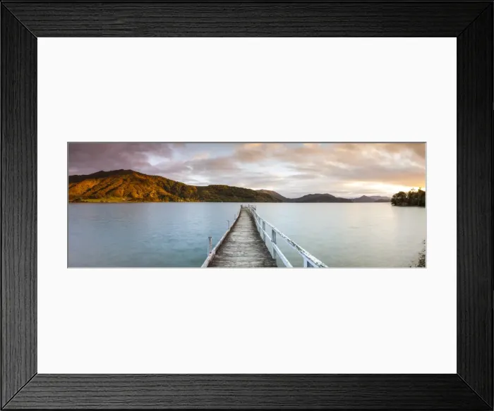 Framed Print : Sunset over picturesque wharf in idyllic Kenepuru Sound, Marlborough Sounds, South Island Framed Print : Sunset over picturesque wharf in idyllic Kenepuru Sound, Marlborough Sounds, South Island