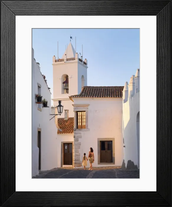 Framed Print : Portugal, Alentejo, Monsaraz, Woman and girl walking down cobbled street (MR) Framed Print : Portugal, Alentejo, Monsaraz, Woman and girl walking down cobbled street (MR)
