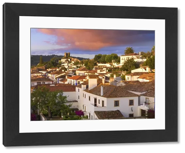 Portugal, Estramadura, Obidos, overview of 12th century town at dusk