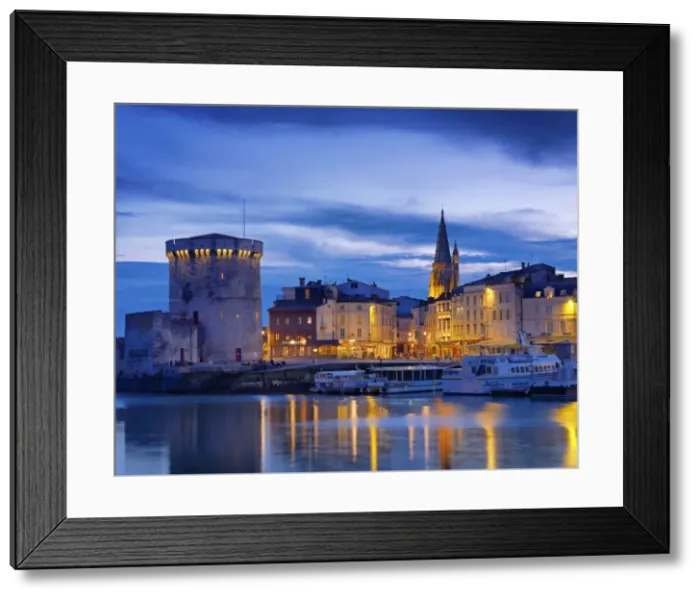 Framed Print : France, poitou-Charentes, La Rochelle, town reflected in harbour at dusk