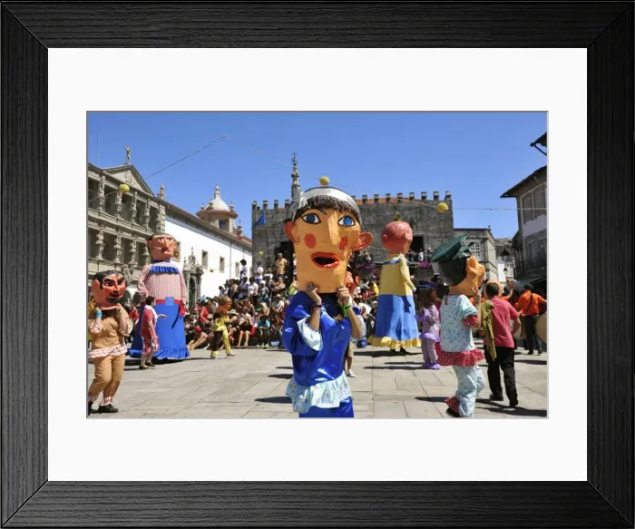 Framed Print : Traditional big-headed masks of Minho at the historical centre of Viana do Castelo